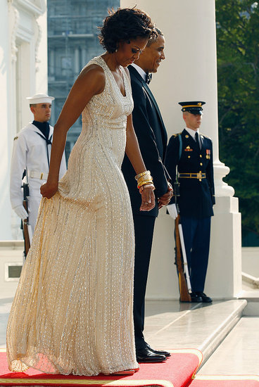 Michelle Obama in Naeem Khan a cena con Angela Merkel Michelle Obama in Naeem Khan a cena con Angela Merkel
