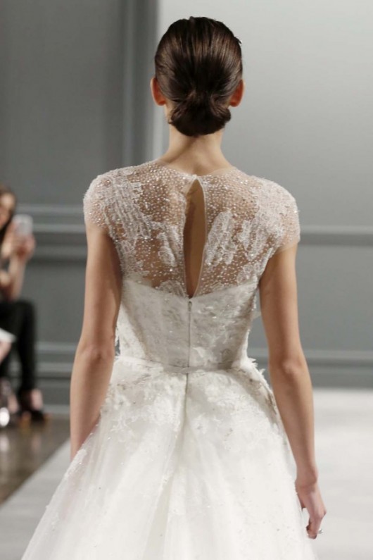 abito da sposa Monique Lhuillier Spring 2014 foto weddingbells.com